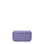 Purple leather crossbody bag by Marc Jacobs with adjustable strap and silver hardware, shown on a plain background.