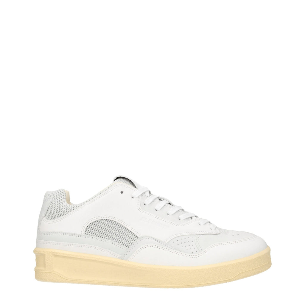 White leather low top sneakers by Jil Sander featuring minimal design and clean stitching, perfect for casual wear.