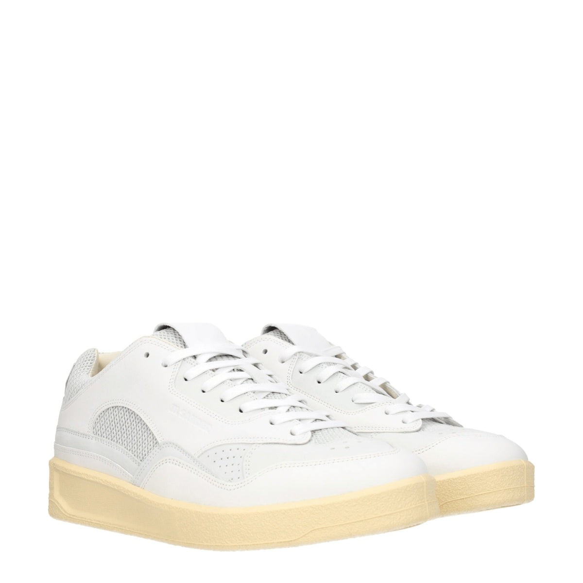 White leather Jil Sander low top sneakers featuring sleek design and minimal detailing for casual and stylish wear.