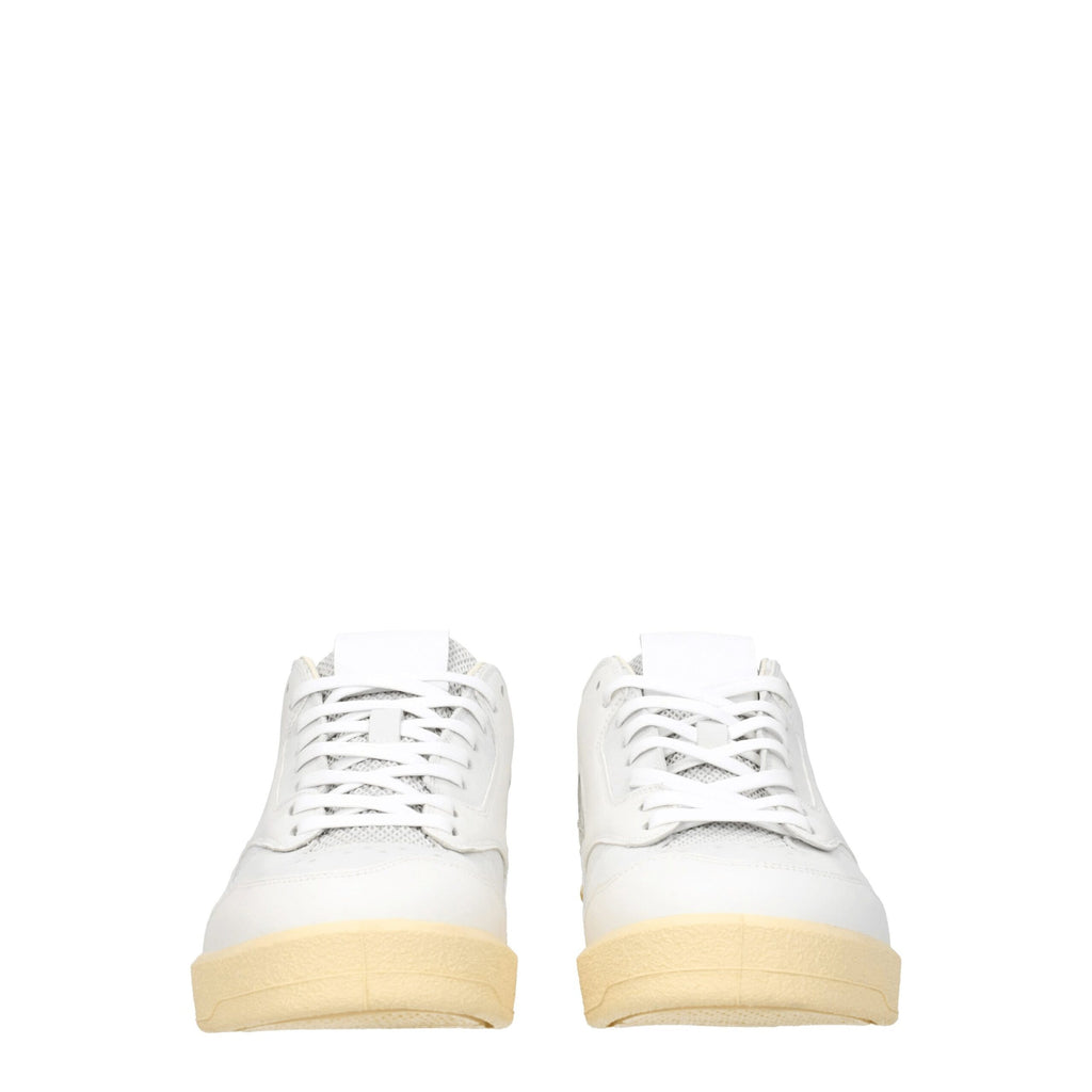 White leather low top sneakers by Jil Sander, featuring minimalistic design and clean stitching.