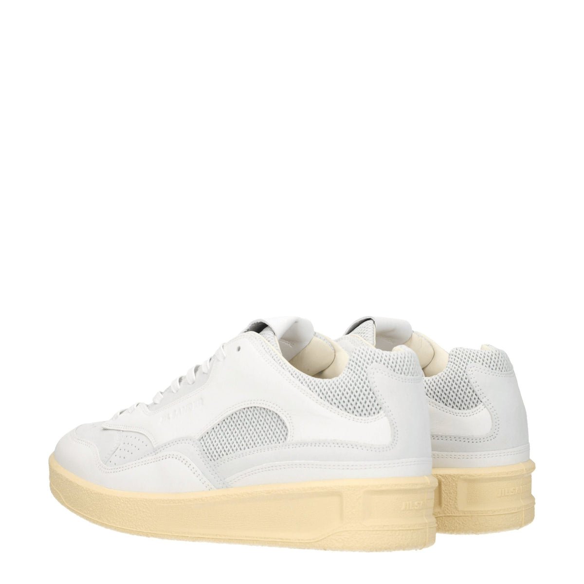 White leather low top sneakers by Jil Sander with sleek design and minimal styling, perfect for casual and stylish outfits.