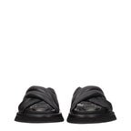 Black leather slippers from Dolce & Gabbana with sleek design and branded detailing, ideal for stylish casual wear.