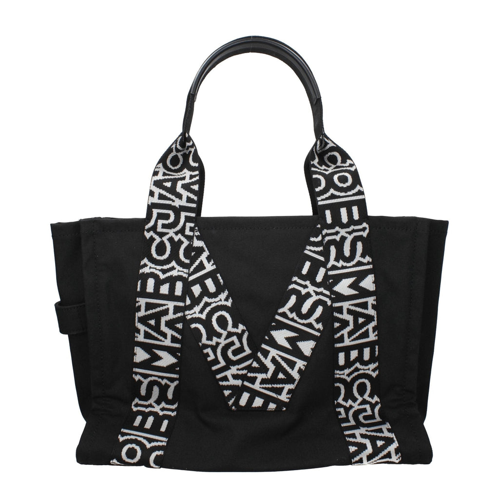 Black fabric shoulder bag by Marc Jacobs with adjustable strap and sleek design, perfect for casual or chic outfits.