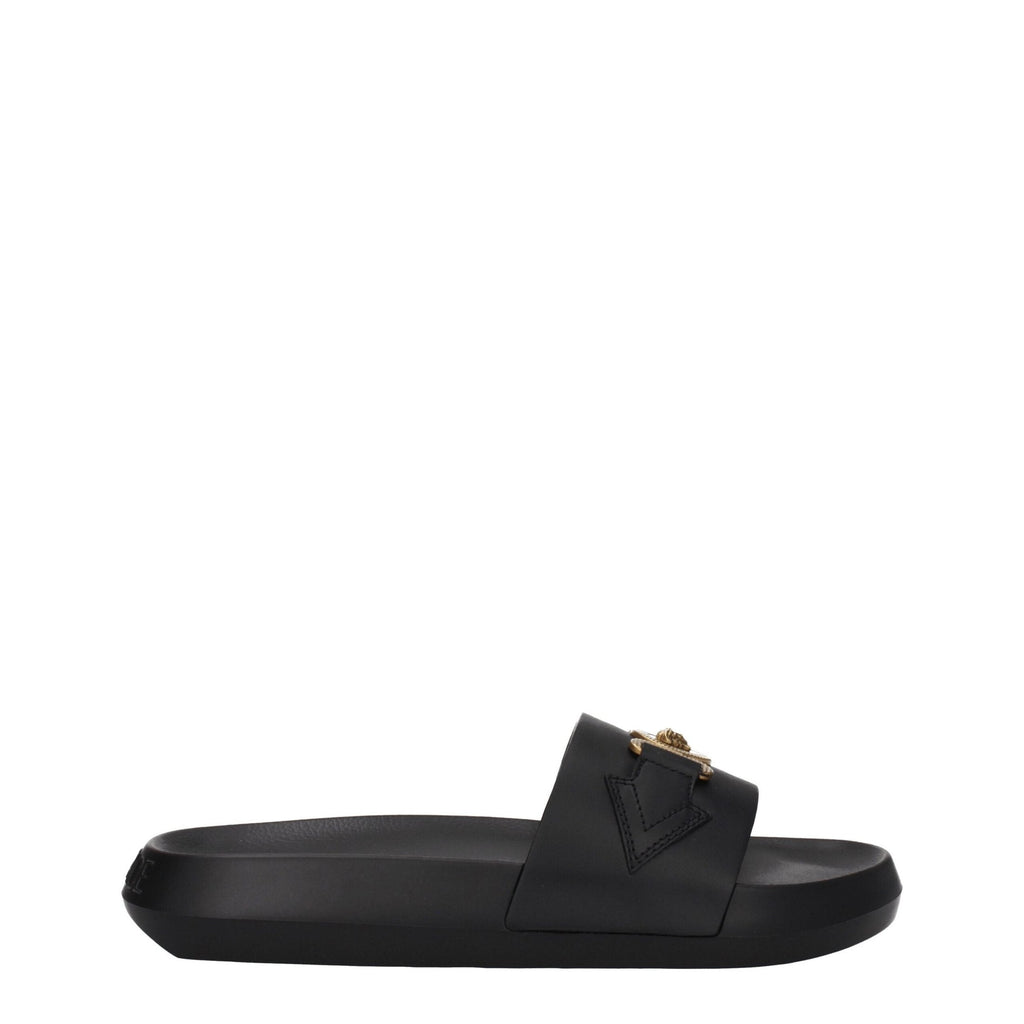 Versace black leather slippers with sleek design and subtle logo detail, perfect for stylish casual wear.