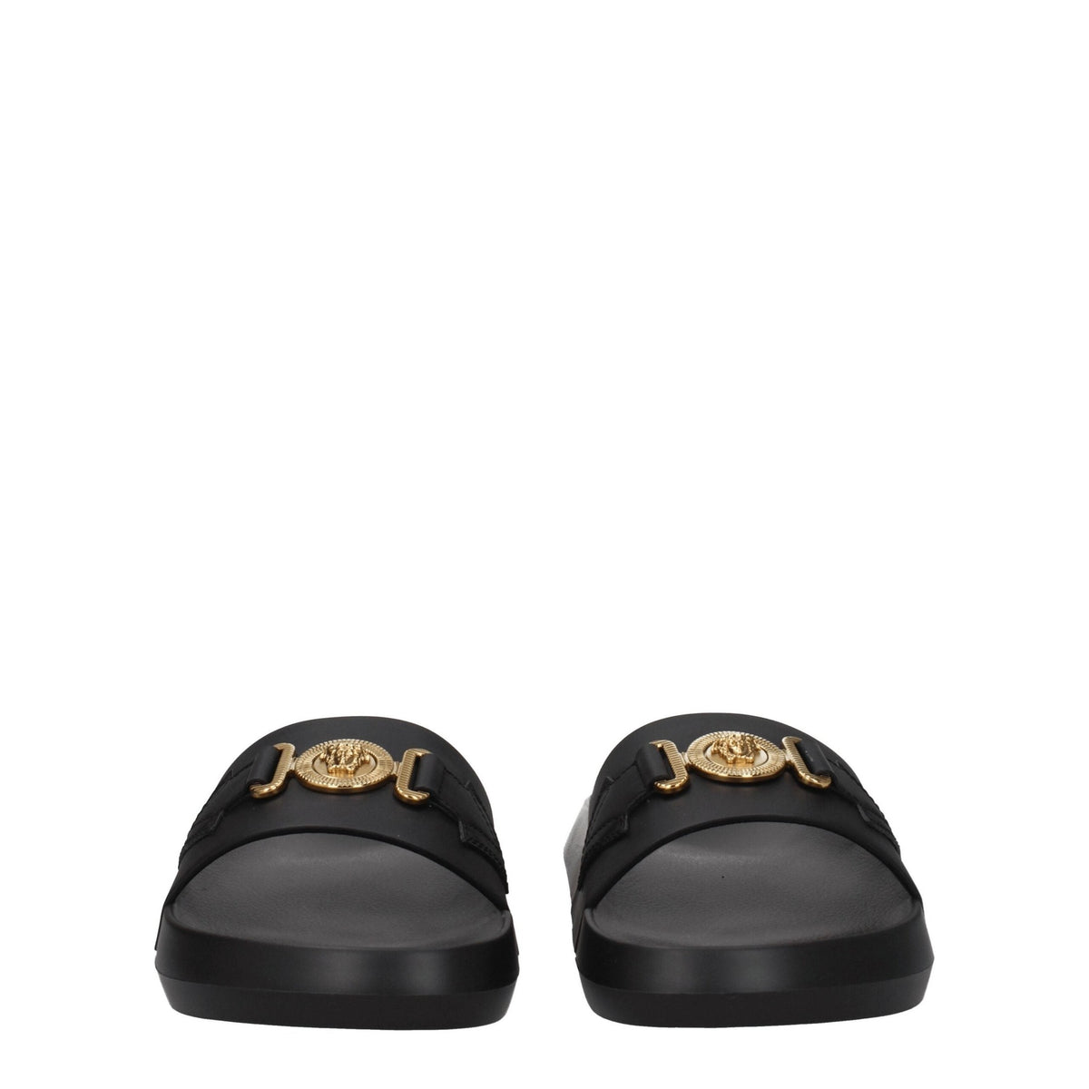Versace black leather slippers with slip-on design and luxurious detailing, ideal for stylish indoor or casual wear.