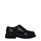 Black leather Dolce & Gabbana oxford shoes and derbies displayed on a clean surface with detailed stitching and classic design.