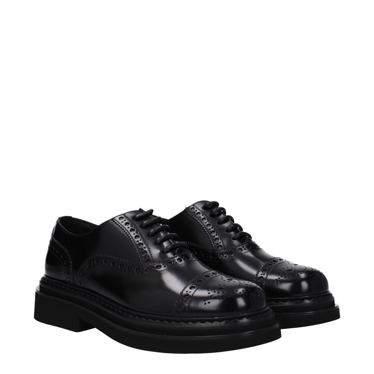 Black leather Dolce & Gabbana oxford shoes and derbies, featuring sleek design and classic lace-up style.