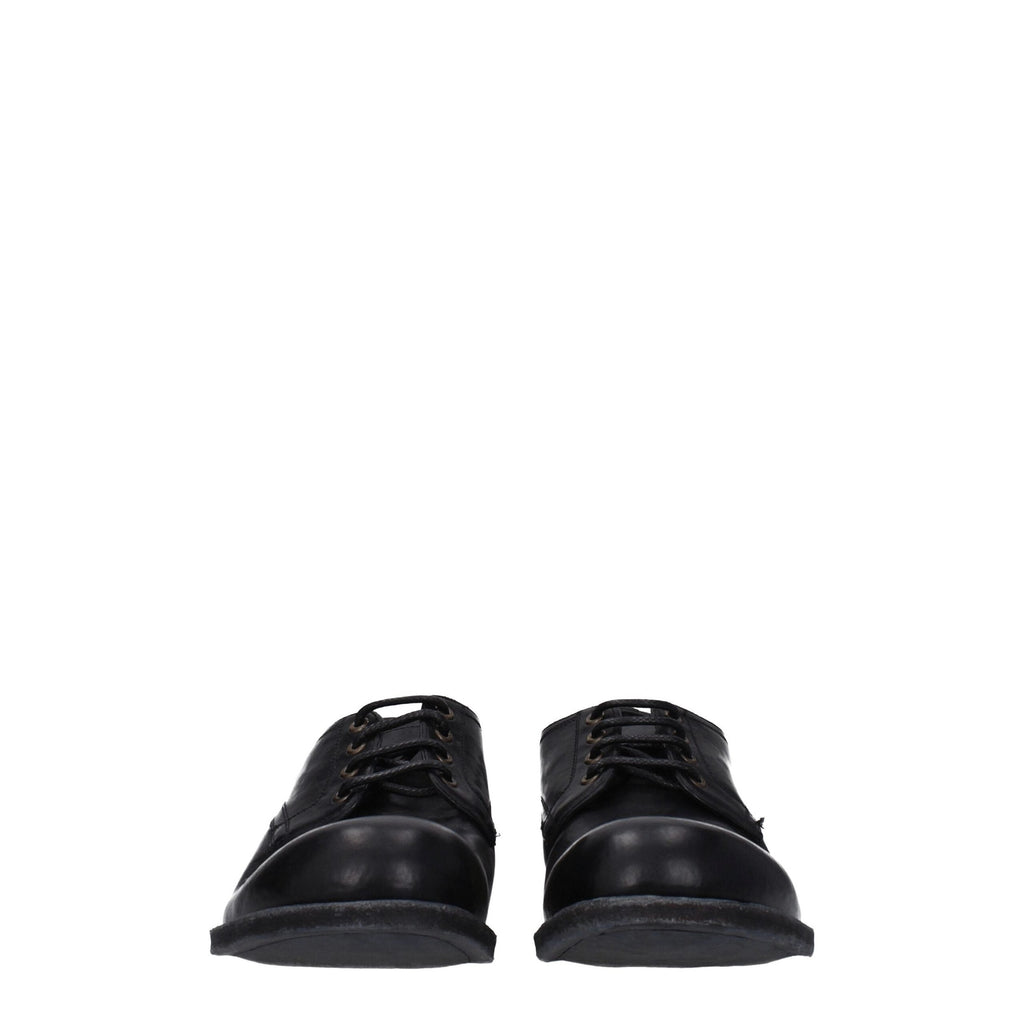 Black leather Dolce & Gabbana oxford shoes and derbies with classic lace-up design and polished finish.