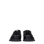 Black leather Dolce & Gabbana oxford shoes and derbies with classic lace-up design and polished finish.