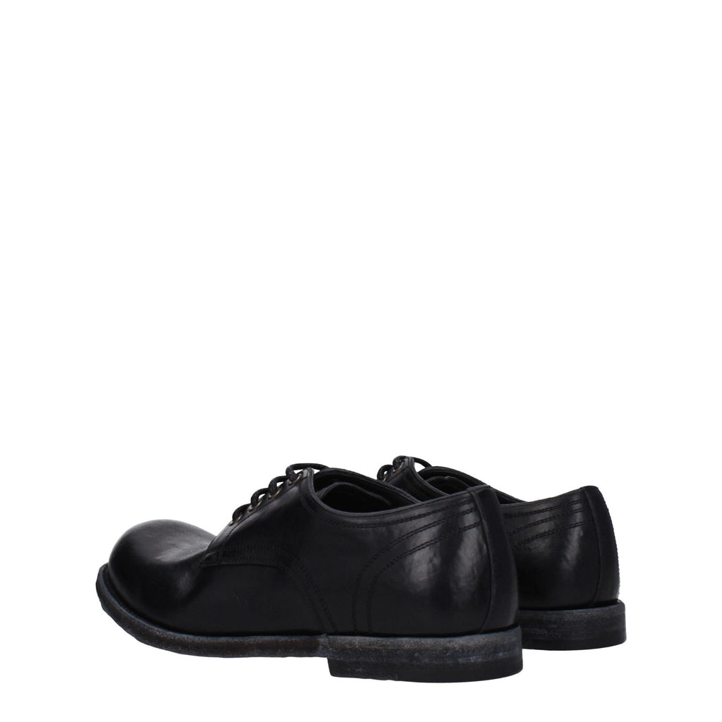 Black leather Dolce & Gabbana oxford shoes and derbies with sleek classic design and detailed stitching.