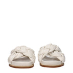 Beige leather slippers by Fabiana Filippi featuring a sleek design and comfortable slip-on style.