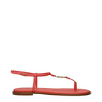 Christian Dior pink leather flip-flop sandals with thong design and flat sole, showcasing elegant and casual footwear style.