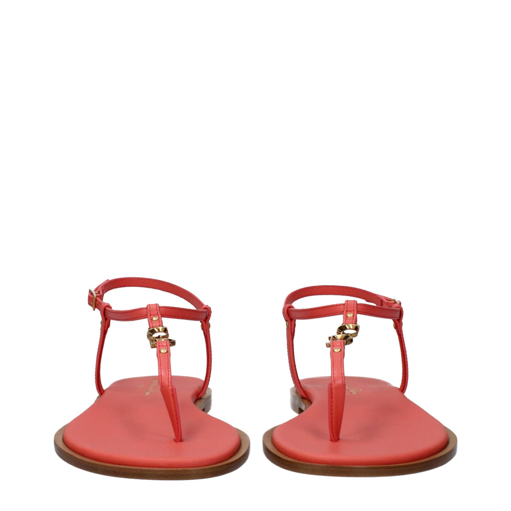 Christian Dior pink leather flip-flop sandals with minimalist design and textured straps, suitable for casual summer wear.