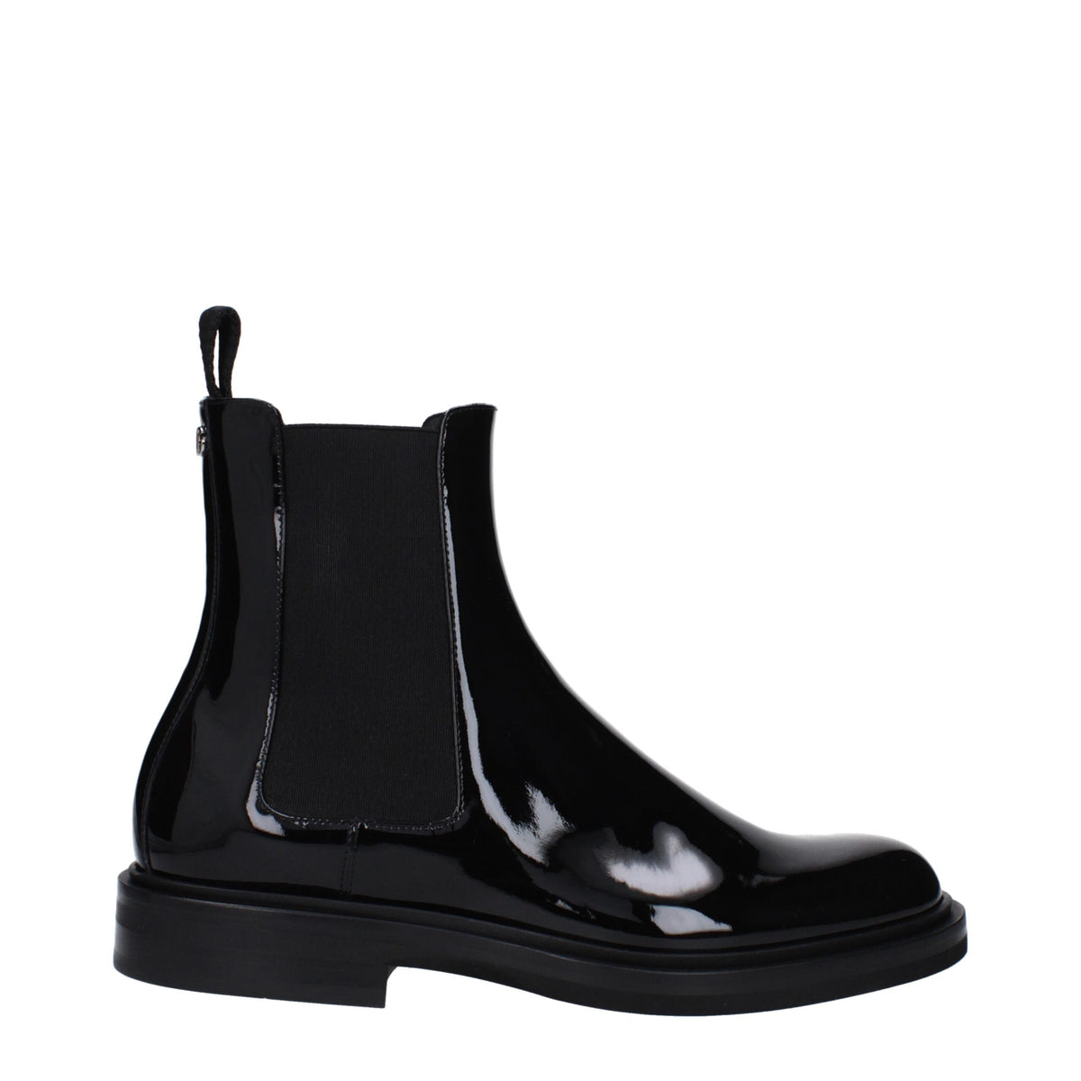 Black leather ankle boots by Dolce & Gabbana with sleek design and pointed toes, showcased on a neutral background.