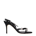 Black satin Manolo Blahnik stiletto heel sandals with elegant straps and pointed toes, perfect for formal or evening wear.