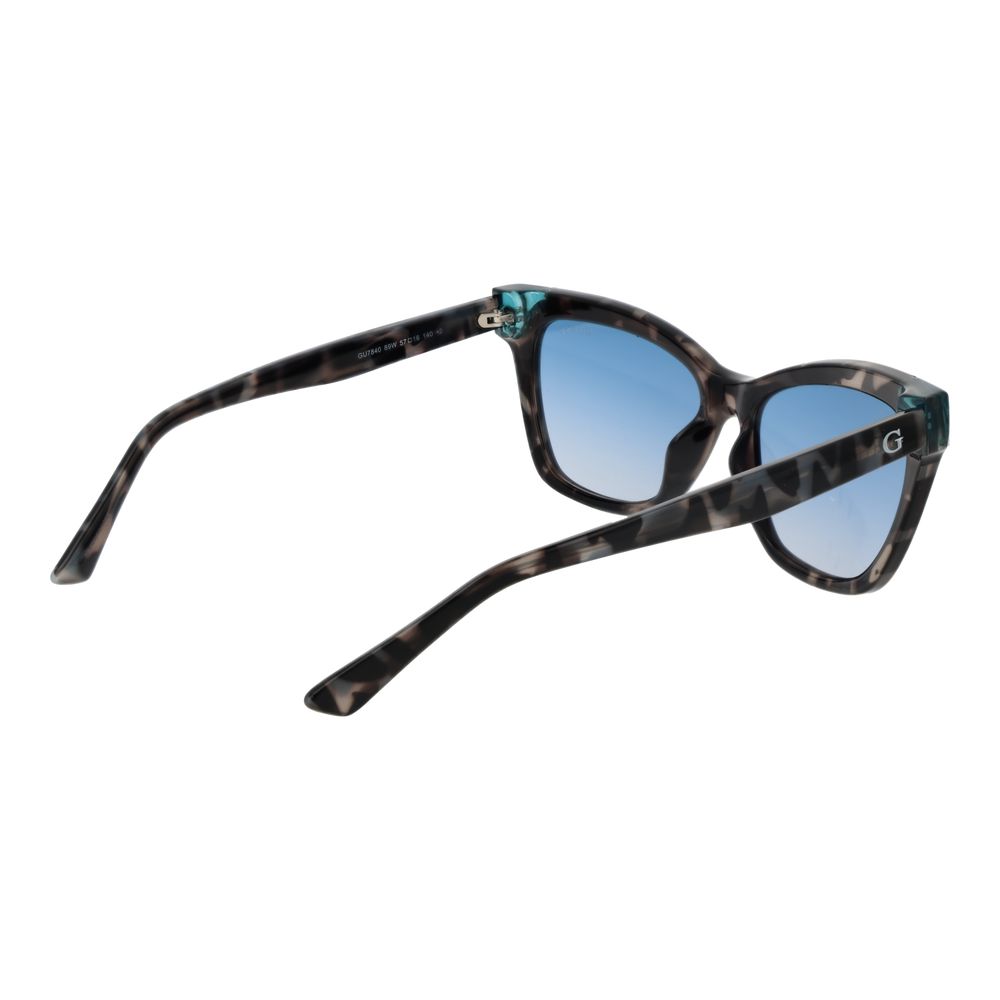 Guess multicolor stainless steel sunglasses with rounded frames and tinted lenses, stylish and modern eyewear.