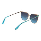 Guess gold metal sunglasses with round frames and tinted lenses, featuring a sleek, stylish design.