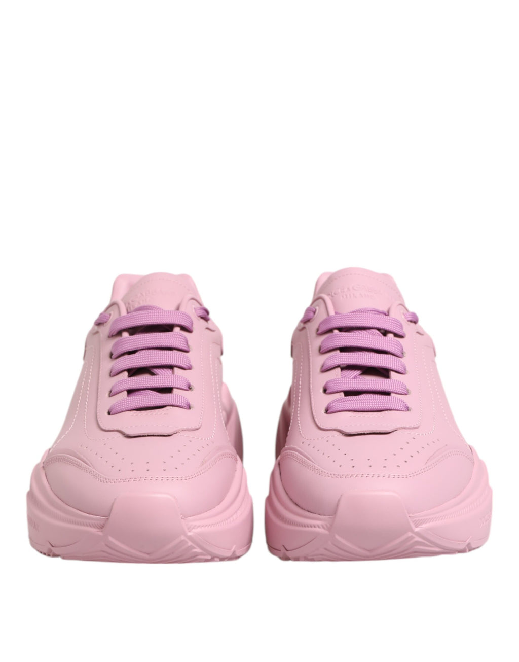 Pink leather Dolce & Gabbana Daymaster low top sneakers featuring a sleek design and white rubber soles.
