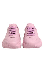 Pink leather Dolce & Gabbana Daymaster low top sneakers featuring a sleek design and white rubber soles.