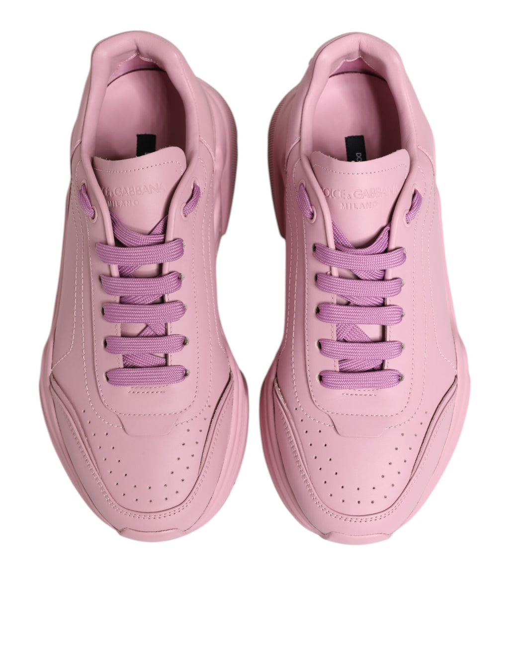 Dolce & Gabbana Pink Leather Daymaster low top sneakers with white soles and stylish design.