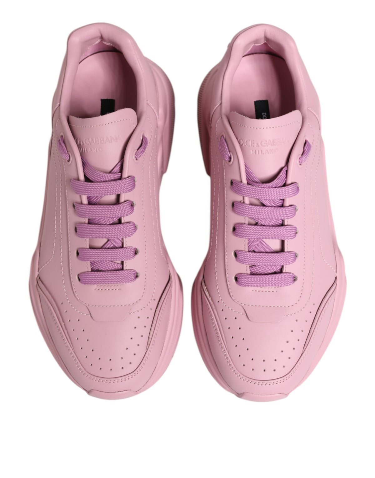 Dolce & Gabbana Pink Leather Daymaster low top sneakers with white soles and stylish design.