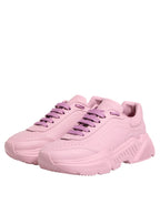 Dolce & Gabbana pink leather Daymaster low top sneakers with white soles and stylish design.