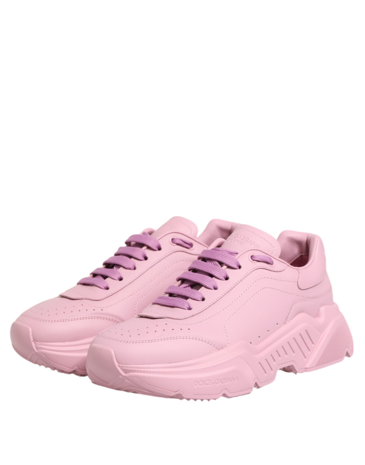 Dolce & Gabbana pink leather Daymaster low top sneakers with white soles and stylish design.