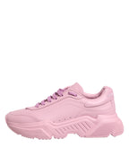 Dolce & Gabbana pink leather Daymaster low top sneakers with white soles and stylish design.