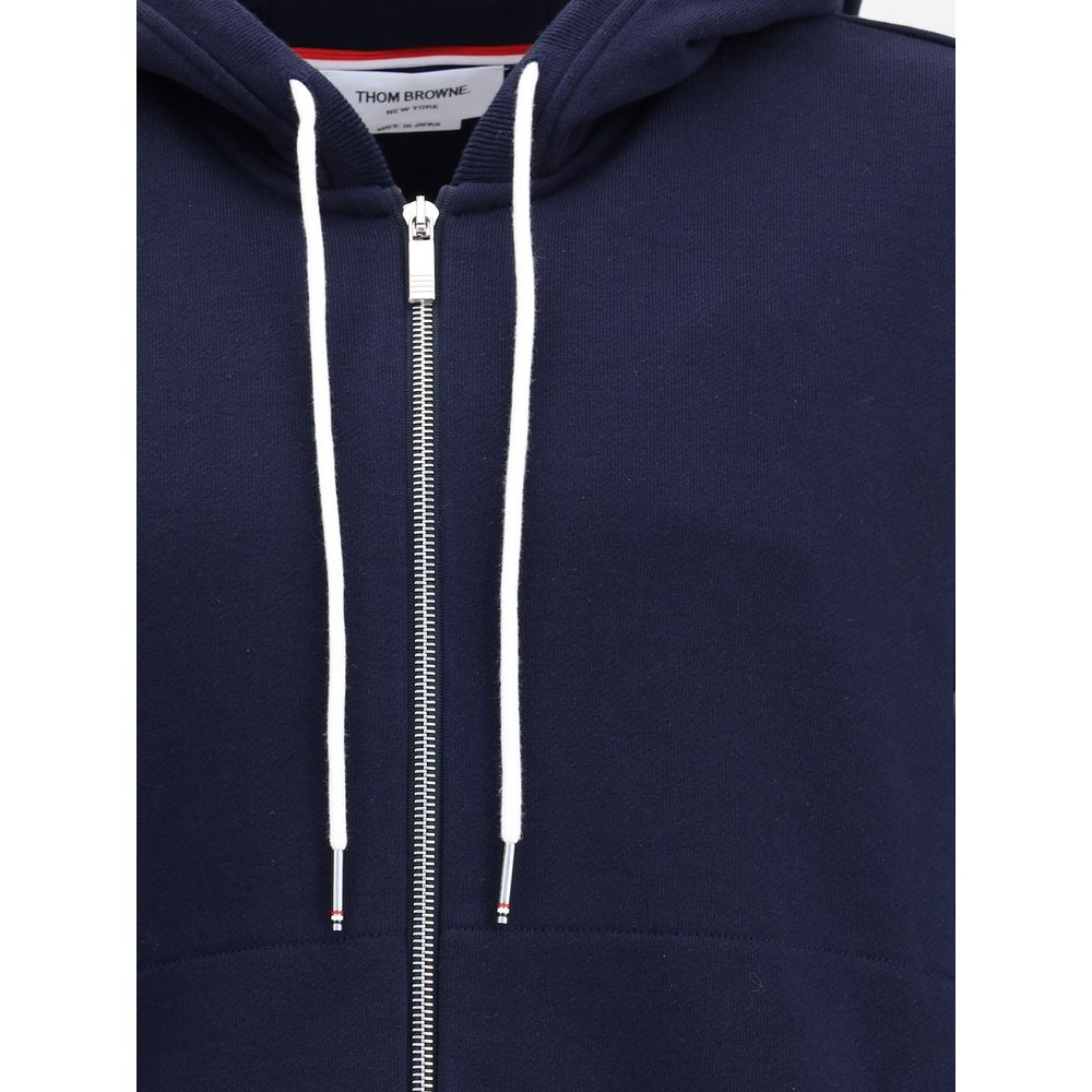 Thom Browne blue cotton sweatshirt with ribbed cuffs and logo details, casual and comfortable for everyday wear.
