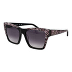 Guess black acetate sunglasses with round frames and dark lenses, stylish eyewear for a modern, trendy look.