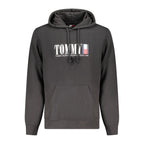 Black cotton men's hoodie by Tommy Hilfiger with front logo and drawstring hood, casual and comfortable apparel.
