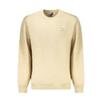 Beige cotton men's sweatshirt from Tommy Hilfiger featuring a crew neck and logo detail on the front.
