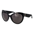Guess black plastic sunglasses with dark tinted lenses and sleek frame, stylish accessory for sun protection and fashion.