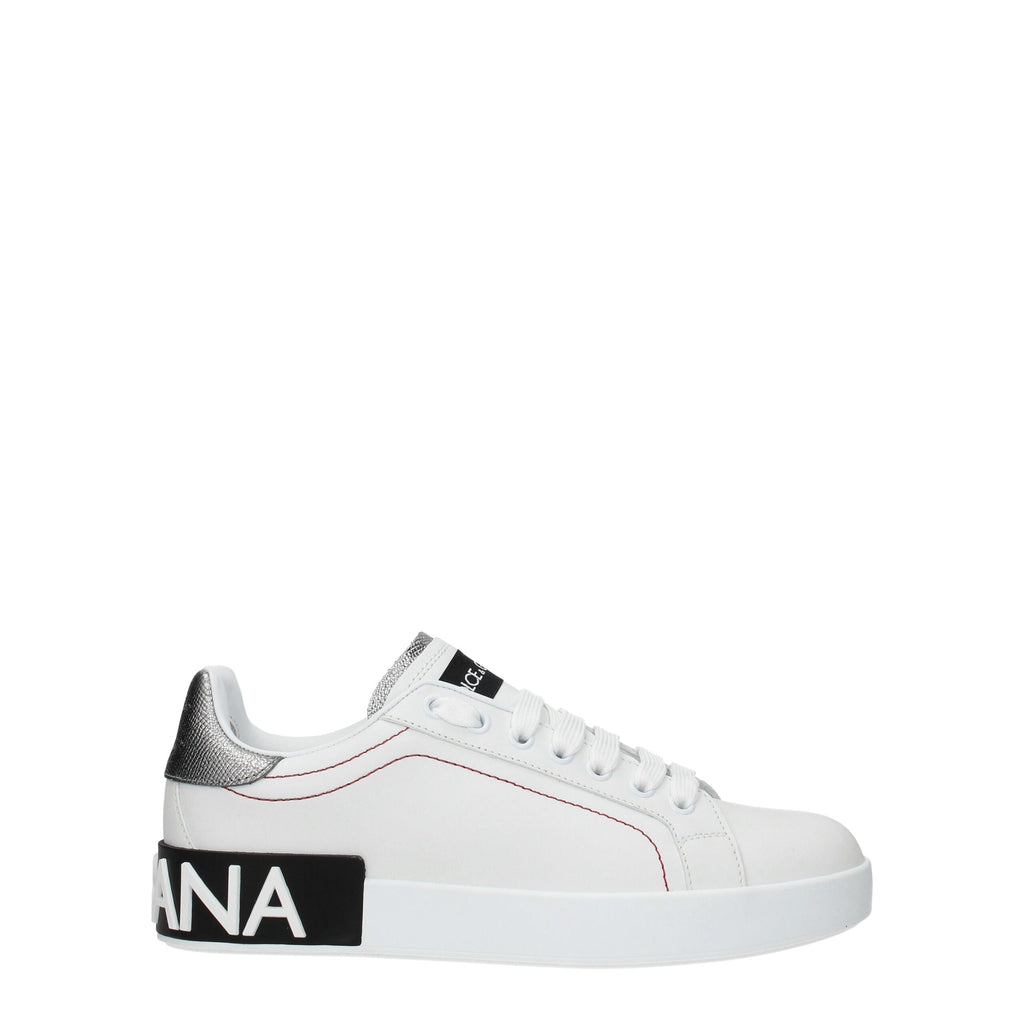 White leather Dolce & Gabbana low top sneakers with sleek design and subtle branding, featuring laces and a rubber sole.