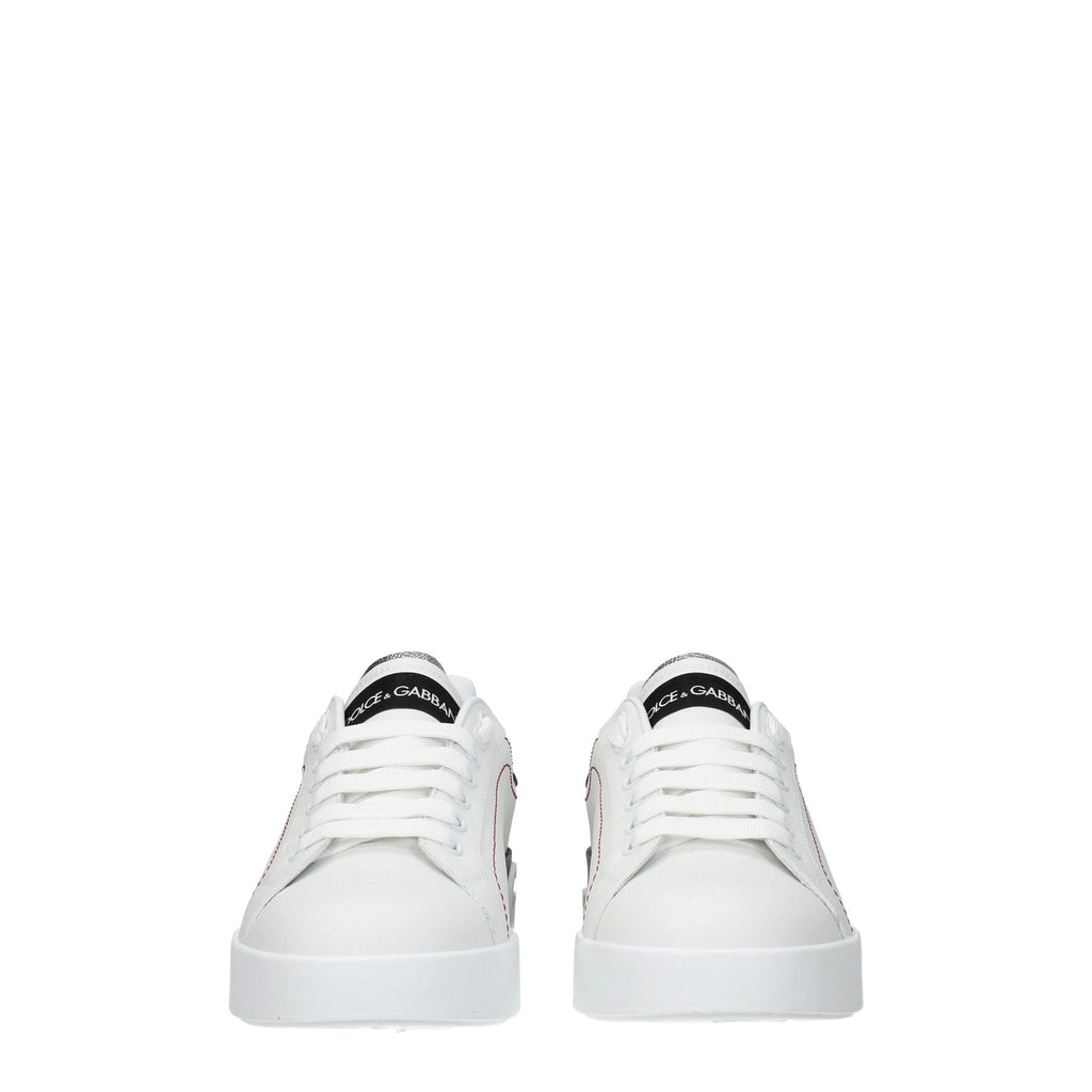White leather Dolce & Gabbana low top sneakers with sleek design and subtle branding on the side.