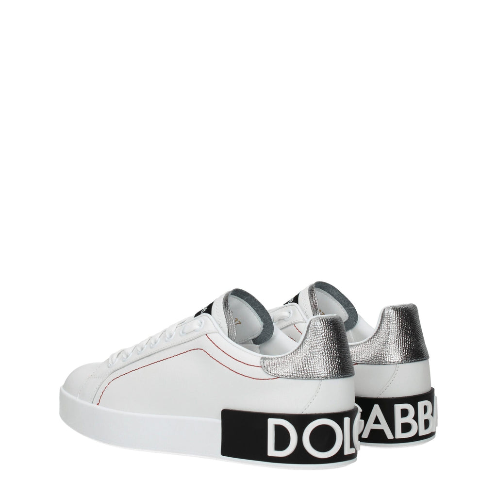 White leather Dolce & Gabbana low top sneakers with sleek design and subtle branding, perfect for casual and stylish outfits.