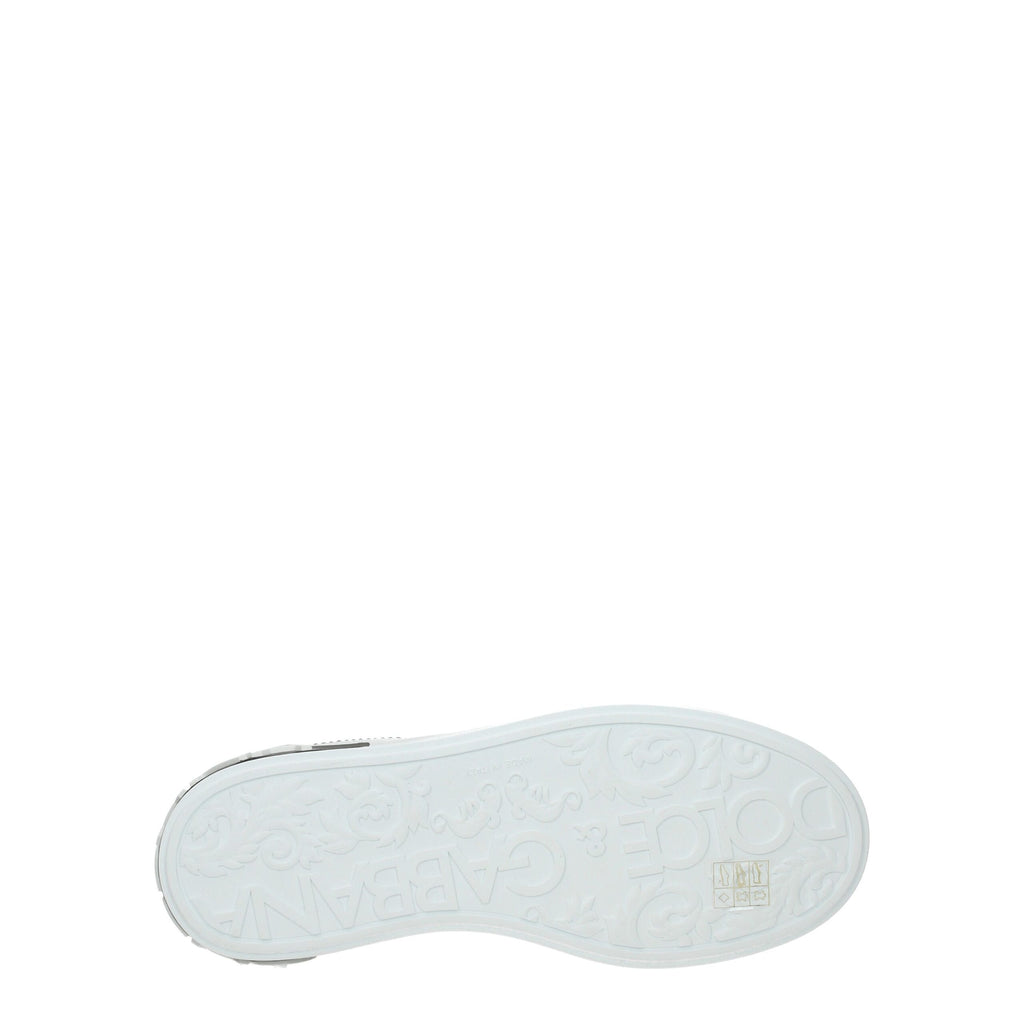 Dolce & Gabbana white leather low top sneakers with lace-up design and stylish branding, perfect for casual wear.