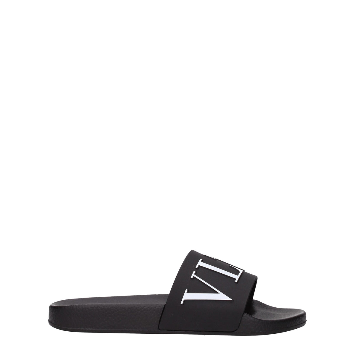 Valentino Garavani black cotton slippers with slip-on design and minimal branding, displayed on a neutral background.