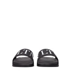 Valentino Garavani black cotton slippers with slip-on design and subtle branding, perfect for casual comfort and stylish wear.