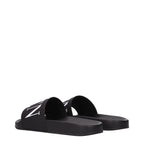 Valentino Garavani black cotton slippers with slip-on design and minimal branding, perfect for casual and comfortable wear.