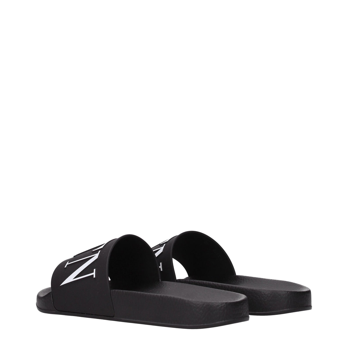 Valentino Garavani black cotton slippers with slip-on design and minimal branding, perfect for casual and comfortable wear.
