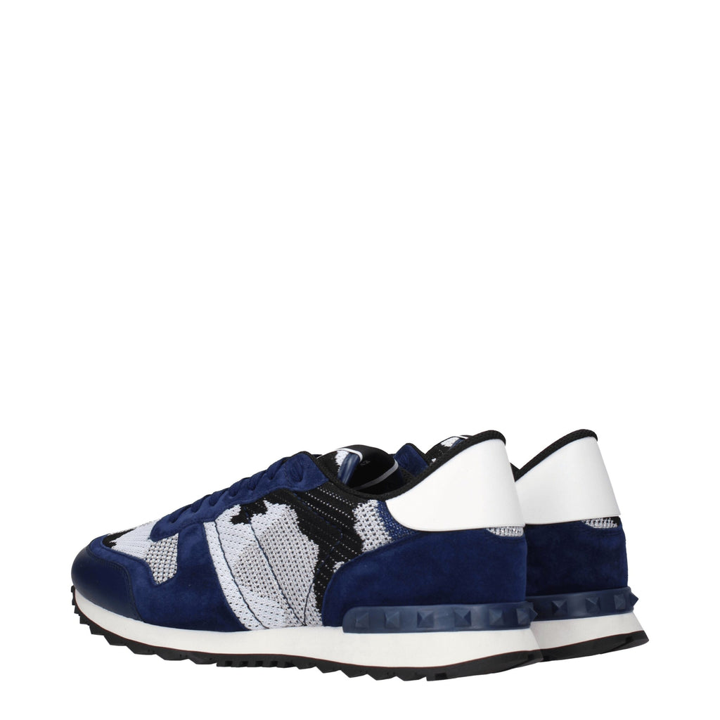 Valentino Garavani gray fabric athletic sneakers with white soles and laces, stylish and comfortable sneakers for active wear.