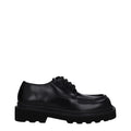 Black leather Dolce & Gabbana oxford shoes and derbies with classic lace-up design and sleek finish.