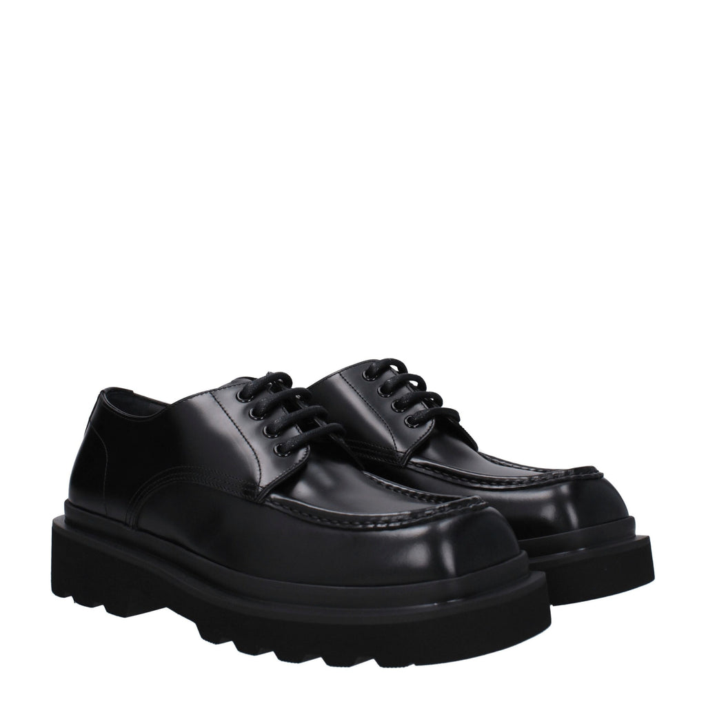 Black leather Dolce & Gabbana oxford shoes and derbies with sleek design and polished finish.
