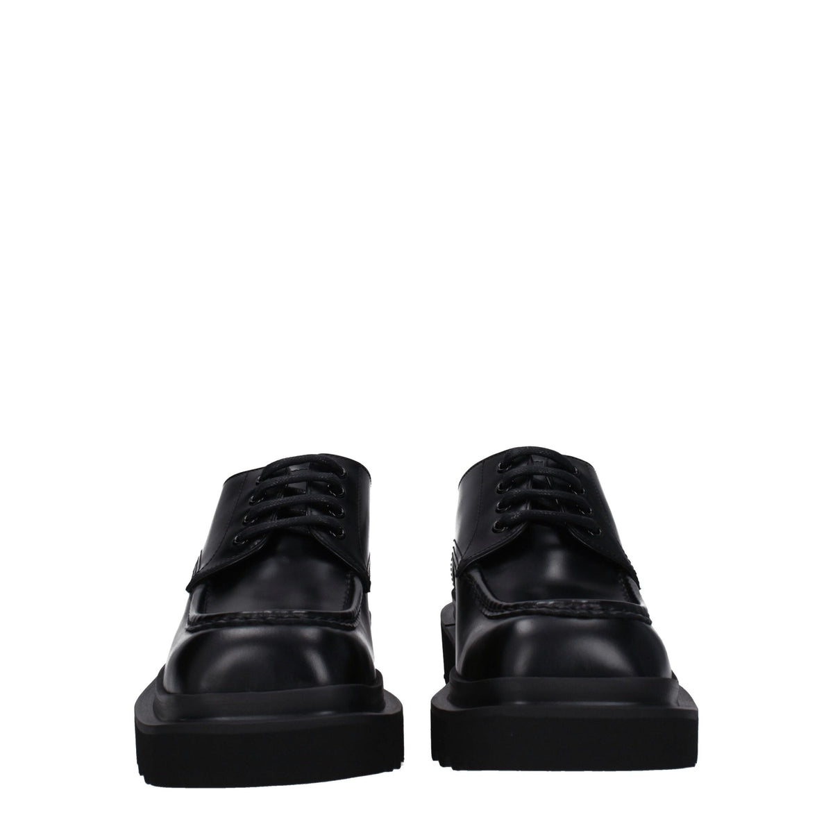 Black leather Dolce & Gabbana oxford shoes and derbies with classic lace-up design and polished finish.