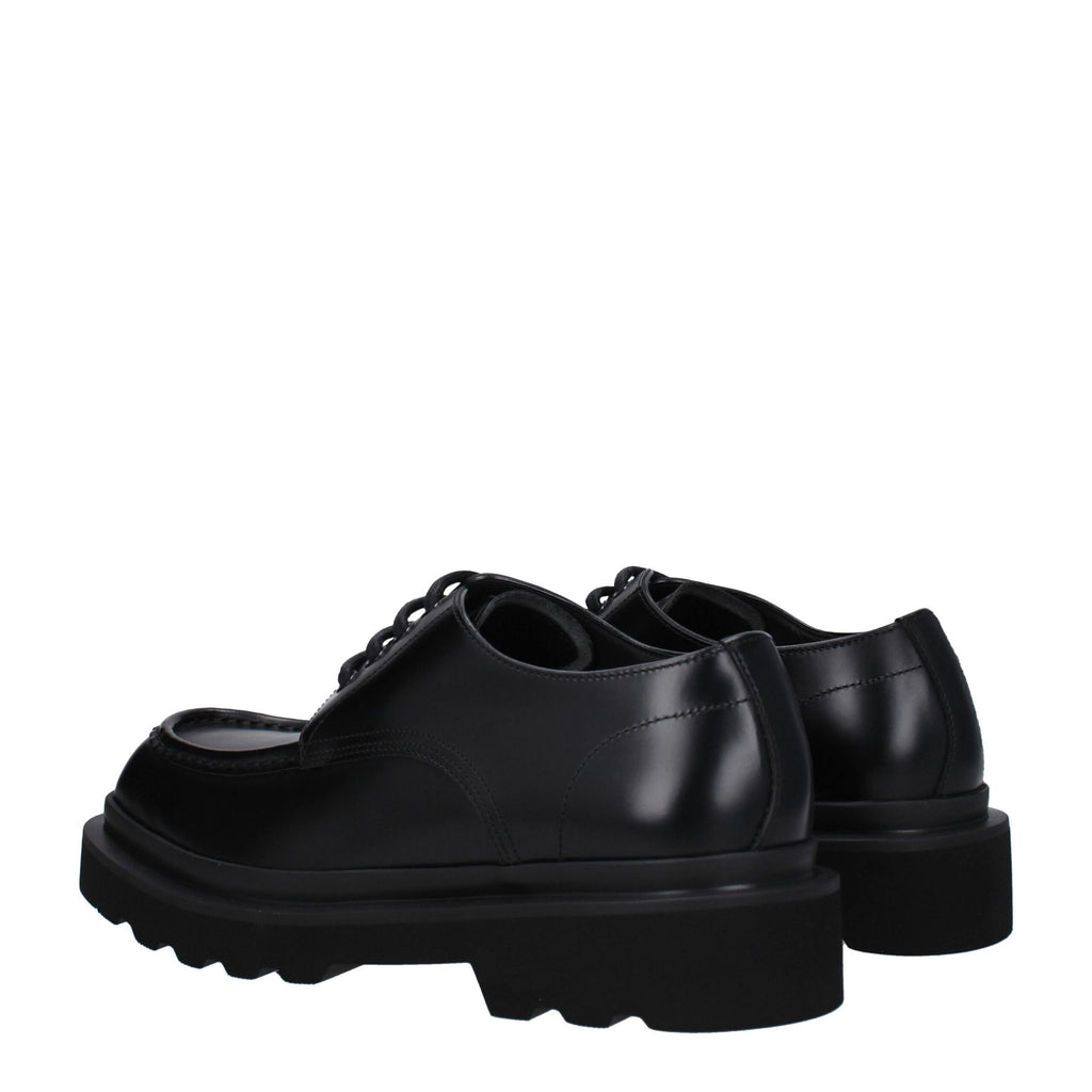 Black leather Dolce & Gabbana oxford shoes and derbies with sleek design and polished finish.