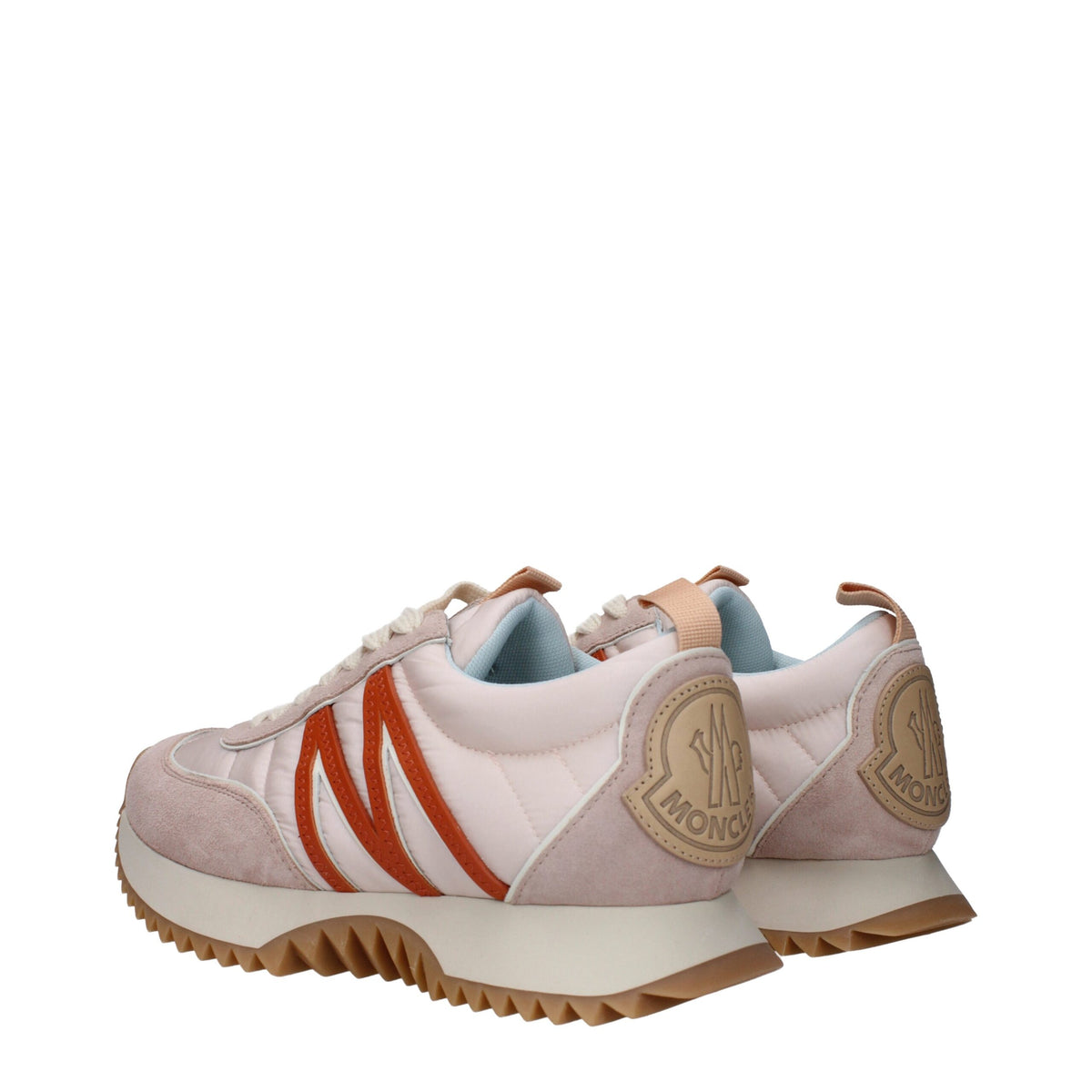 Pink fabric Moncler chunky sneakers with thick soles and stylish design, perfect for casual and sporty outfits.