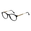 Andy Wolf black acetate glasses frames shown on a model, featuring a sleek, modern design with clear lenses and stylish detailing.