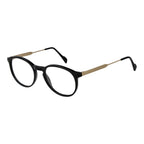 Andy Wolf black acetate glasses frames shown on a model, featuring a sleek, modern design with clear lenses and stylish detailing.