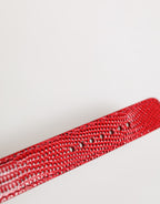 Dolce & Gabbana red exotic leather women’s armband with gold-tone metal buckle and detailed design.